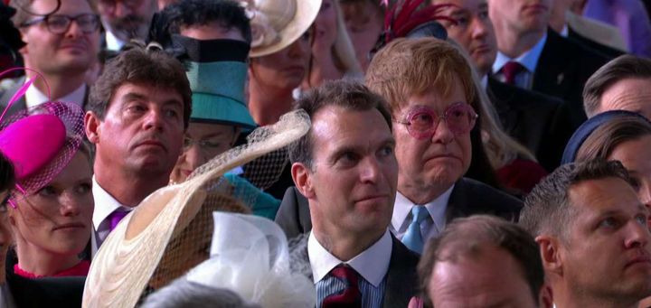 Even Elton John's iconic glasses could not mask his reaction to Michael Curry's address.