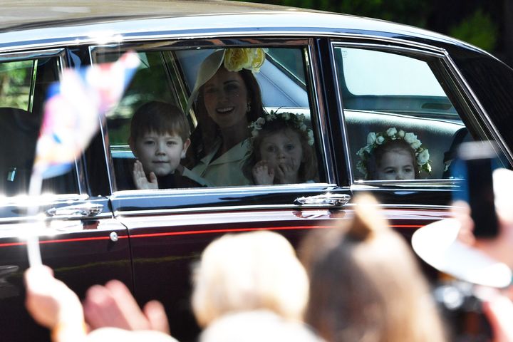 The Duchess of Cambridge arrives with Princess Charlotte and bridesmaids for the wedding ceremony.
