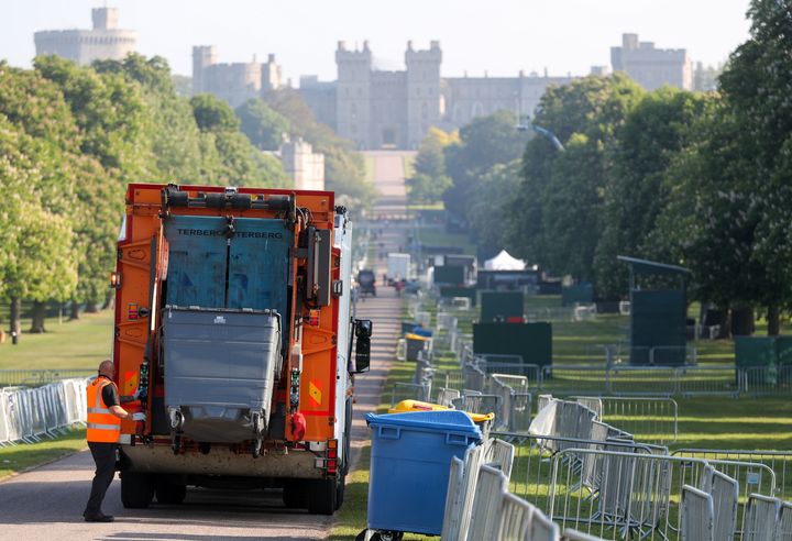 A bin lorry makes its way down the Long Walk in Windsor, as the clean-up continues after the royal wedding.