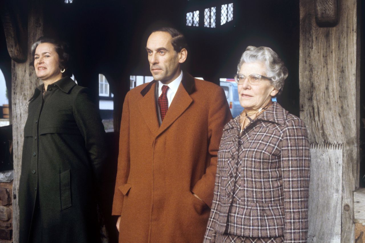Jeremy Thorpe, with his wife Marion (L) and mother Ursula outside court