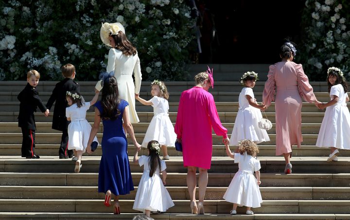 The Duchess of Cambridge, Prince George and Princess Charlotte with other bridesmaids and members of the wedding party arrive at St George's Chapel in Windsor Castle for the wedding of Prince Harry and Meghan Markle.