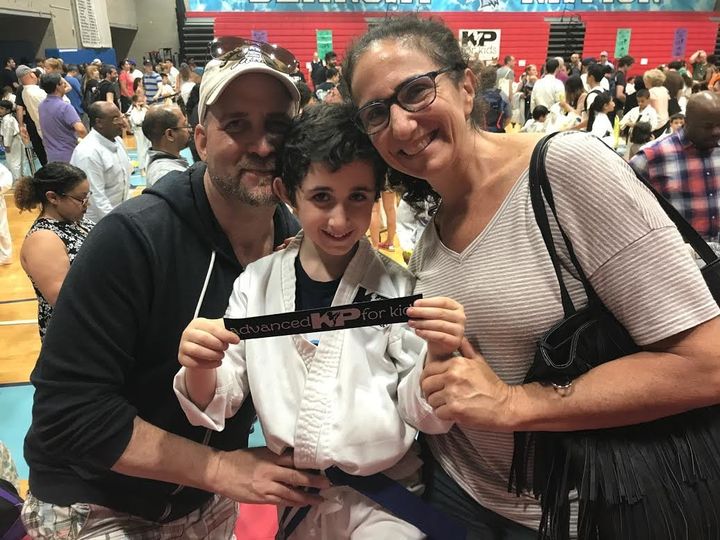David Arrick, Nate and Heidi at Nate's karate class exposition in New York City in 2017.