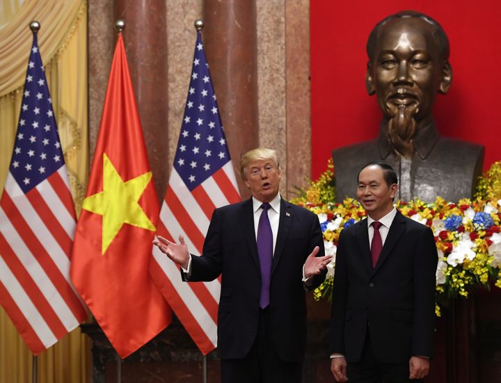 U.S. President Donald Trump poses with Vietnamese President Trần Đại Quang during a welcoming ceremony at the Presidential Palace in Hanoi on Nov. 12, 2017.