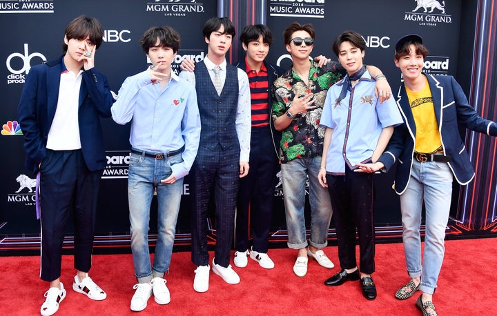 BTS walk the Billboard Awards red carpet on May 20.