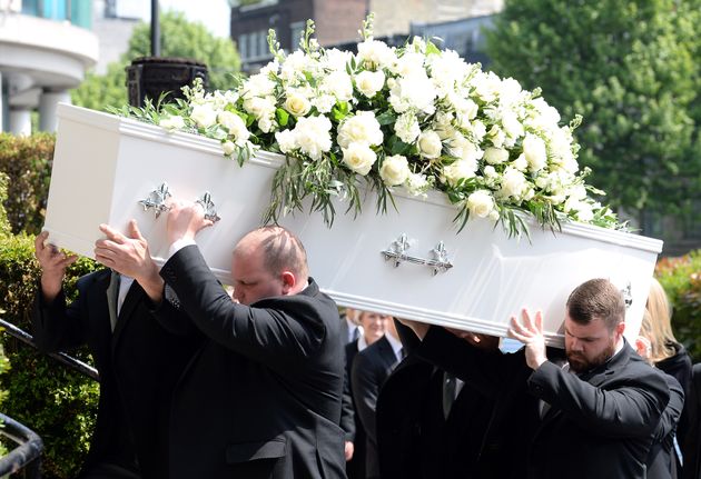 Dale's coffin being brought into church