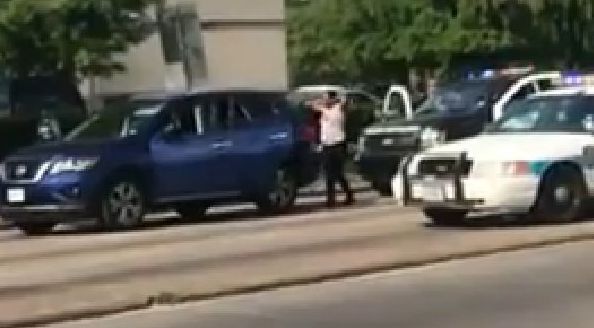An officer in Houston was filmed on May 19 ordering a woman to put her hands up, saying, "Pretend like we’re going to shoot you."