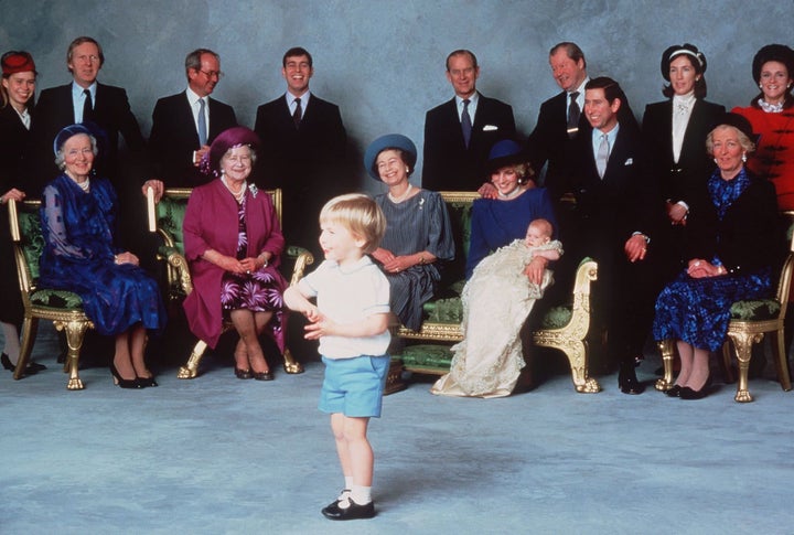 Prince Harry was christened at Windsor Castle on Dec. 21, 1984. In this official photo, he and his mother are surrounded by royal relatives and godparents amused at the antics of young Prince William.