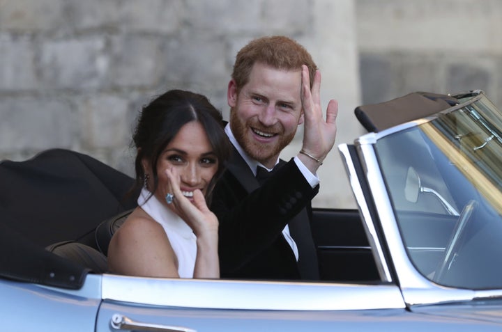 Meghan Markle and Prince Harry on their way to Frogmore House for their wedding reception. 
