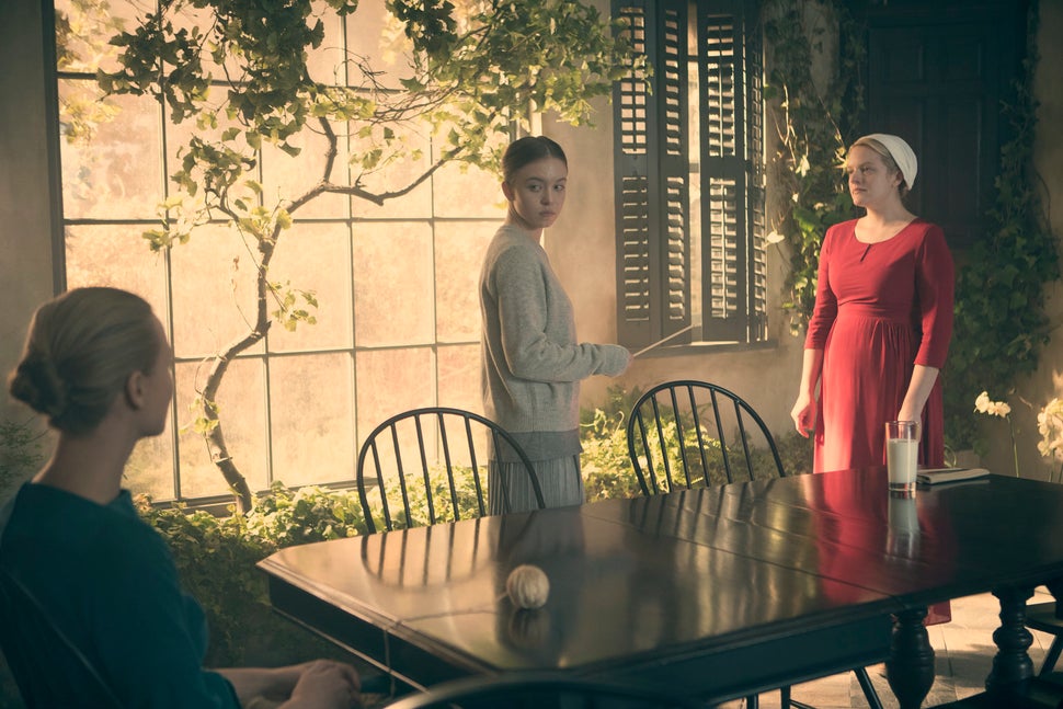 Three women, one set of knitting needles.