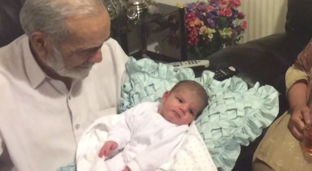 Ali Yawar Jafari with his grandson