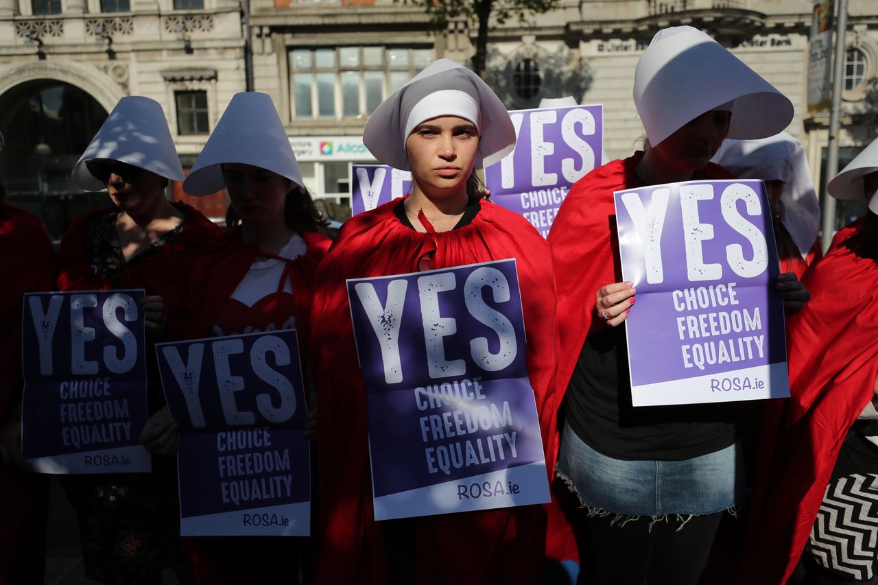 Pro-choice activists dressed in outfits inspired by The Handmaids Tale