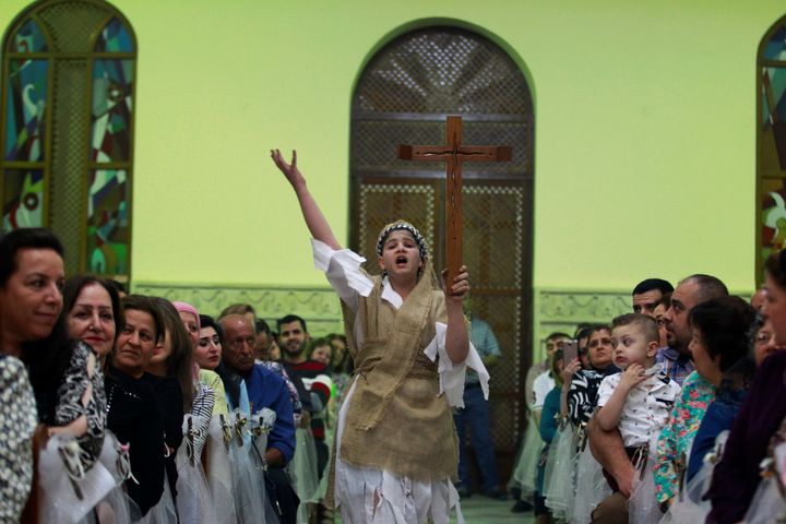 An Easter celebration in Baghdad last year. Candidates from the Babylon Brigade won two of the five seats reserved for Iraq’s Christians in the country’s parliamentary elections in May, and the group’s ties to an Iranian-backed armed group has some Iraqi Christians concerned.