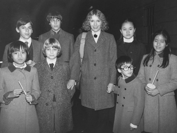 Actress Mia Farrow with her children (back row) Matthew, Sascha, Soon-Yi; (front row) Daisy, Fletcher, Moses and Lark. Moses Farrow wrote a scathing essay accusing his mom of repeated physical abuse.