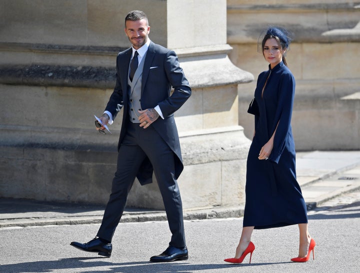 David and Victoria Beckham arrive at the royal wedding on May 19. 