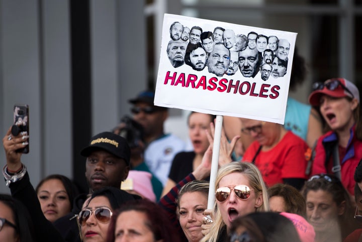 Protesters attend a Me Too rally to denounce sexual harassment and assaults of women in Los Angeles, California on November 12, 2017.