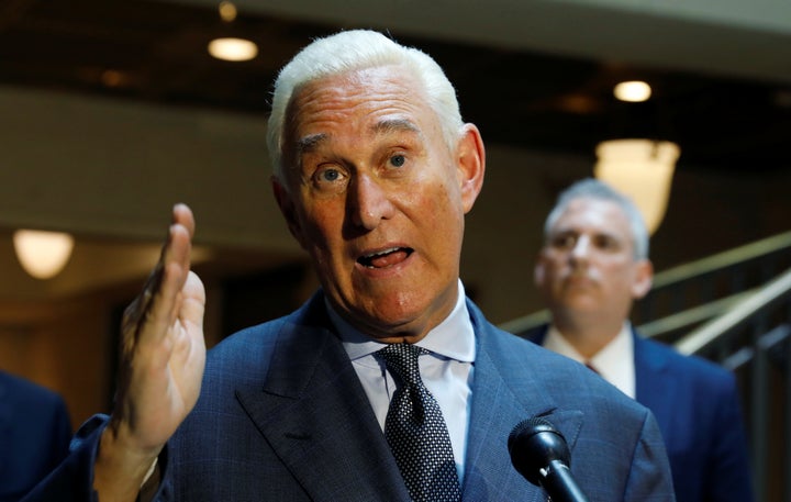 Roger Stone talks to reporters last year after testifying before the House Intelligence Committee.