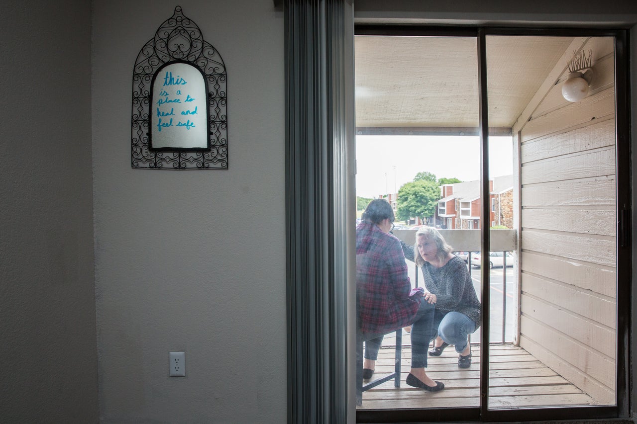 Donna Bloom, director of legal services at Denton County Friends of the Family, visits Amanda at the transitional housing.