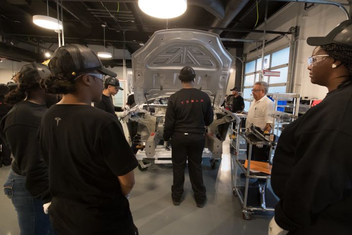 New Tesla employees learn how to use tools safely in a training session at the Fremont, Calif., factory. State safety regulators have cited Tesla eight times since 2013 for deficient training, including twice in the last year. 