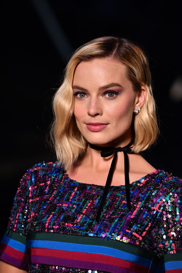 Margot Robbie's wavy bob is classic, but the asymmetric cut with one side slight longer than the other adds a moder