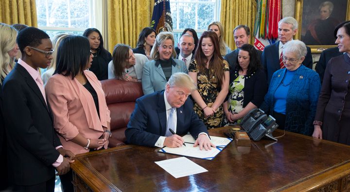 President Donald Trump signs the Allow States and Victims to Fight Online Sex Act on April 11. Like the Mann Act a century earlier, the law is being used to target women.