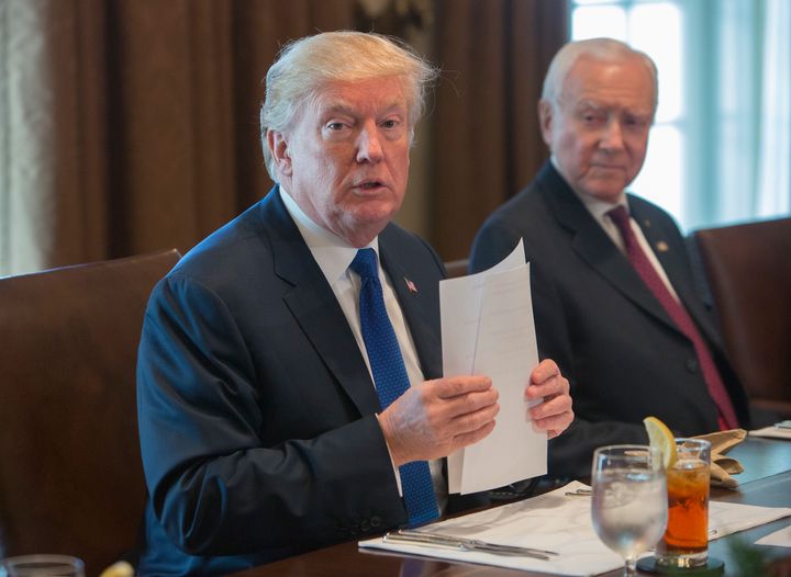 President Trump and Sen. Hatch appear together in December 2017. The two on Saturday announced the release of a Utah man jailed abroad.