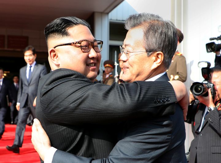 Kim Jong-Un and Moon Jae-In embrace at the border