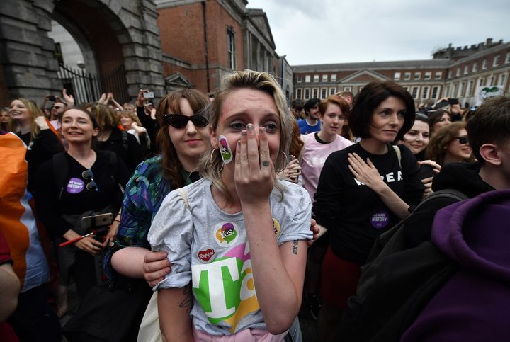 A 'Yes' voter breaks down in tears as the results are announced 