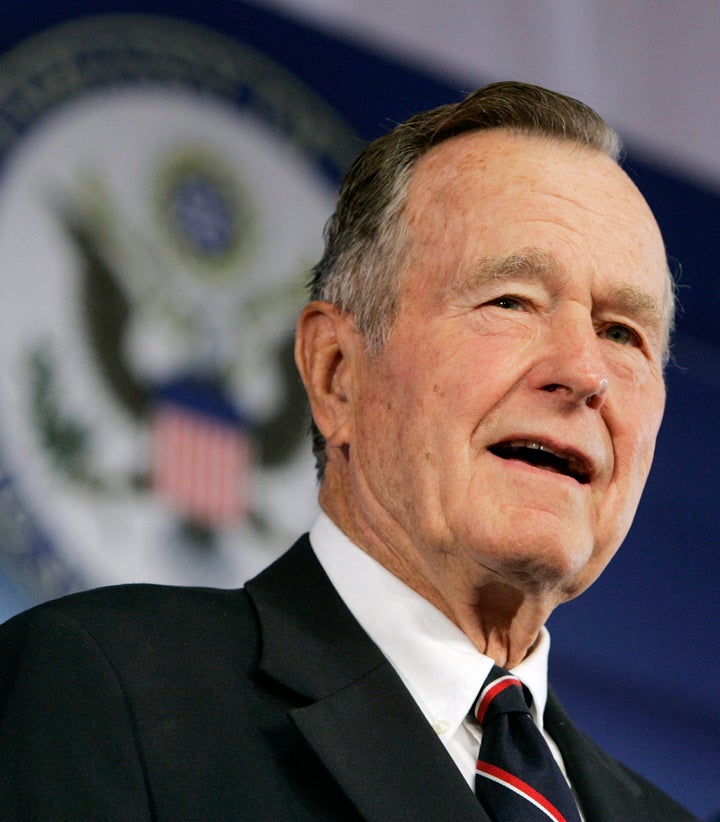 Bush travels to Beijing, where he once served in the top U.S. diplomatic post, to help dedicate the new U.S. Embassy in