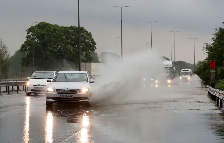 Traffic on the M42 in the West Midlands navigates standing water after heavy rain this weekend.