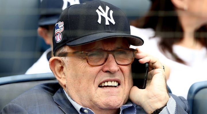 Rudy Giuliani takes in a New York Yankees game on May 28. The crowd loudly booed the former New York City mayor when the PA announcer announced his presence Monday.