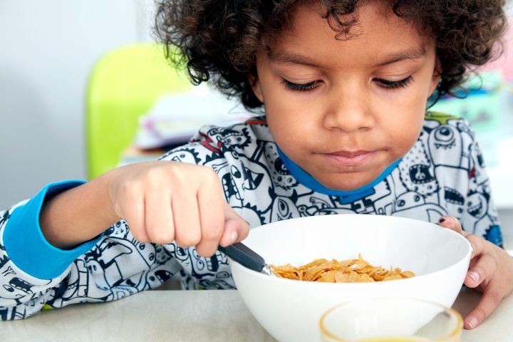 child eating healthy breakfast