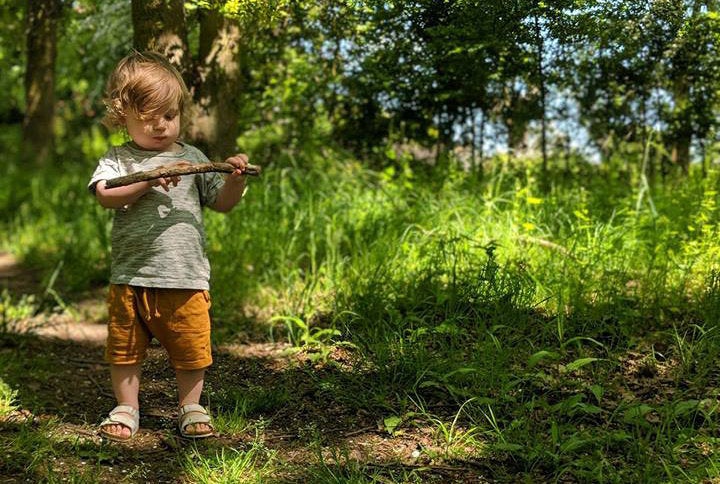 Dad Stephen Skinner's son Atlas enjoying the outside discovering woodland treasures.