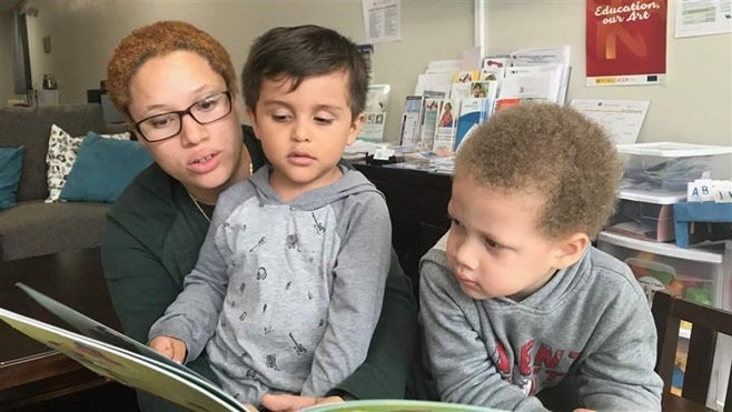 Victoria Castro reads to her son and his friend at the Liberty Family Success Center in Kearny, New Jersey. Some locales are