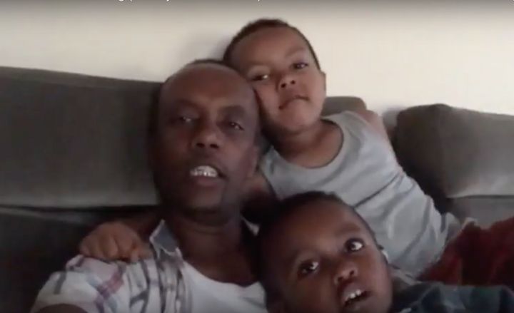 Paulo Tekle with his two sons.