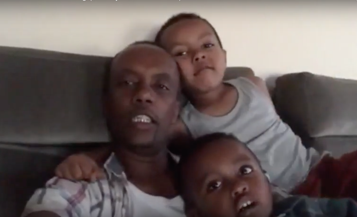 <strong>Paulo Tekle with his two sons.</strong>