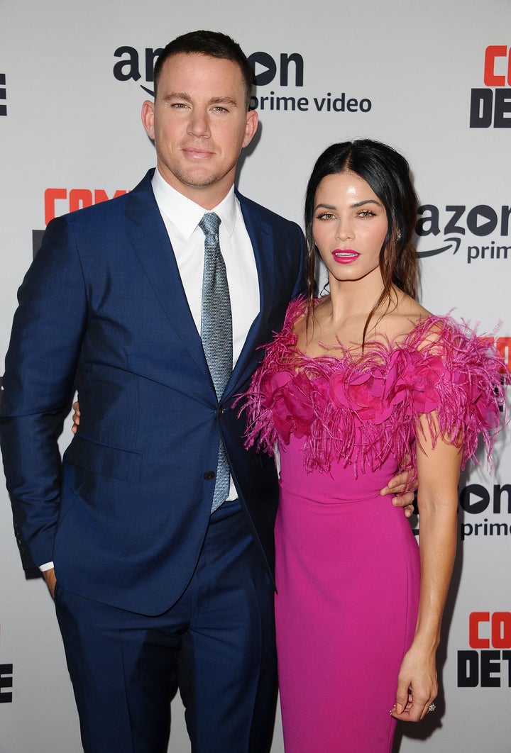 Channing Tatum and actress Jenna Dewan walk a red carpet together in August 2017. 