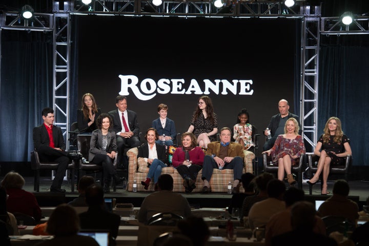 Roseanne Barr sits front and center with the cast of her now-canceled reboot, "Roseanne."