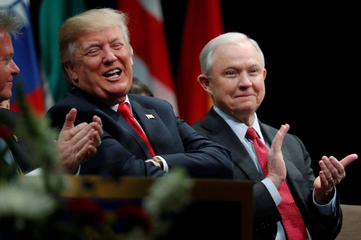 President Donald Trump with Attorney General Jeff Sessions at a graduation ceremony at the FBI Academy in Quantico, Virginia, on Dec. 15.