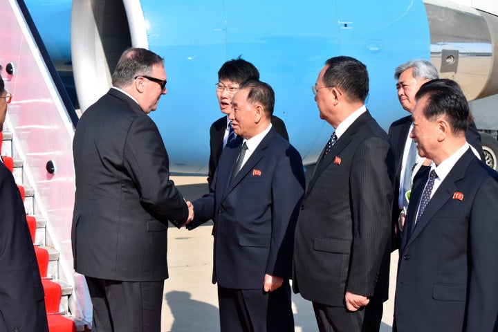 U.S. Secretary of State Mike Pompeo (left) is greeted by Kim Yong Chol in Pyongyang on May 9, 2018.