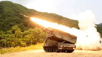 A rocket is launched from a M-270A1, multiple launch rocket system, during a combined rocket live fire training exercise of the 1-38th Field Artillery, 210th Fires Brigade of the U.S. 2nd Infantry Division and South Korean Army's artillery unit 2000 at Rocket Valley training area near the demilitarized zone separating the two Koreas, in Cheorwon, 77 km (48 miles) northeast of Seoul, June 12, 2012. The exercise was conducted to increase readiness to defend South Korea according to the U.S. 2nd Infantry Division. REUTERS/Lee Jae-Won (SOUTH KOREA - Tags: MILITARY)