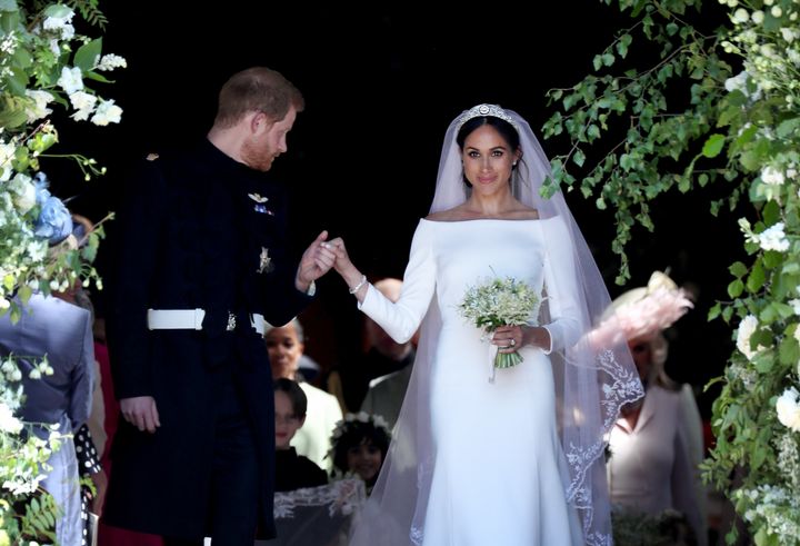 The Duke and Duchess of Sussex on their big day. Embroiderers working on the veil washed their hands every half-hour to keep it spotless before the ceremony.