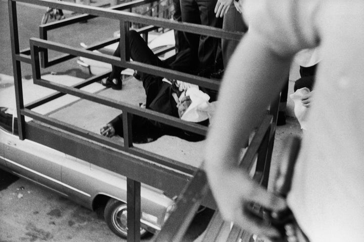 The partially covered body of slain American civil rights leader Martin Luther King Jr. on the balcony of a Memphis motel after his assassination on April 4, 1968.