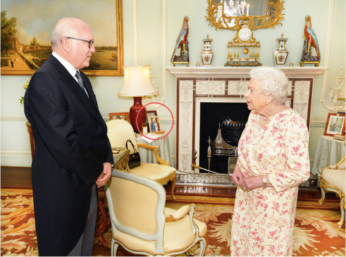 Queen Elizabeth II and the Honorable George Brandis, the Australian high commissioner to the U.K., at Buckingham Palace in May.