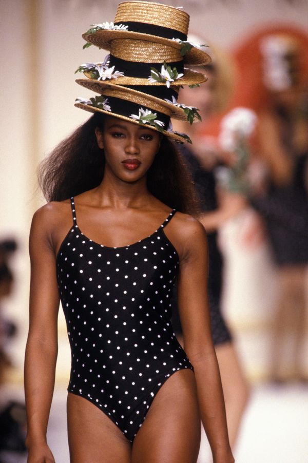 Walking the runway during a fashion show in Paris.