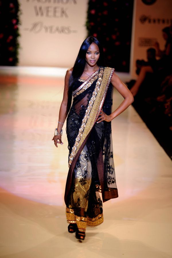 Walking the runway for My Mumbai, a charity show at the Lakme Fashion Week in Mumbai, India.