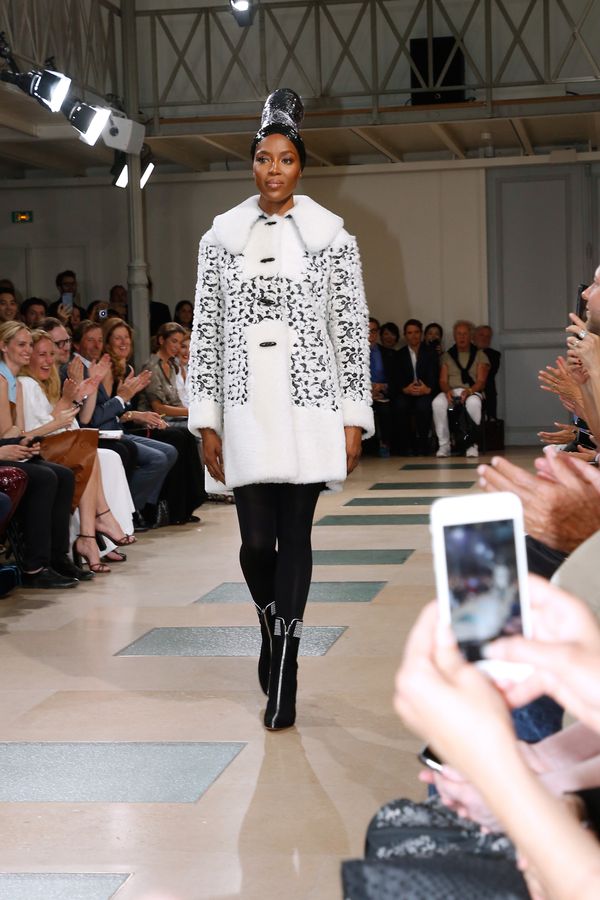 Walking at the end of the Azzedine Alaia show as part of Haute Couture Paris Fashion Week.