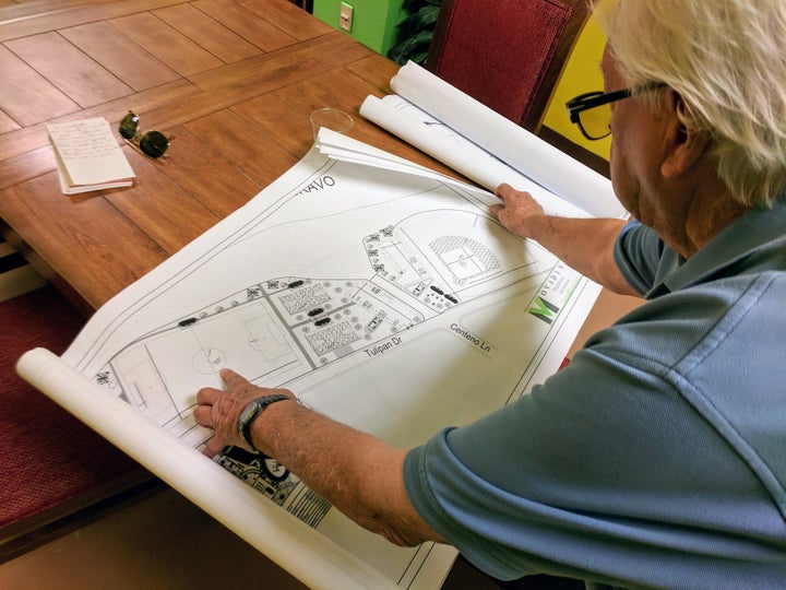 Rio Bravo Mayor Francisco Peña displays architectural plans for a park the city will inaugurate on July 4, 2018. The park will sit directly across from the culvert where a migrant woman named Claudia Gómez allegedly crossed into the United States before a Border Patrol agent shot and killed her.