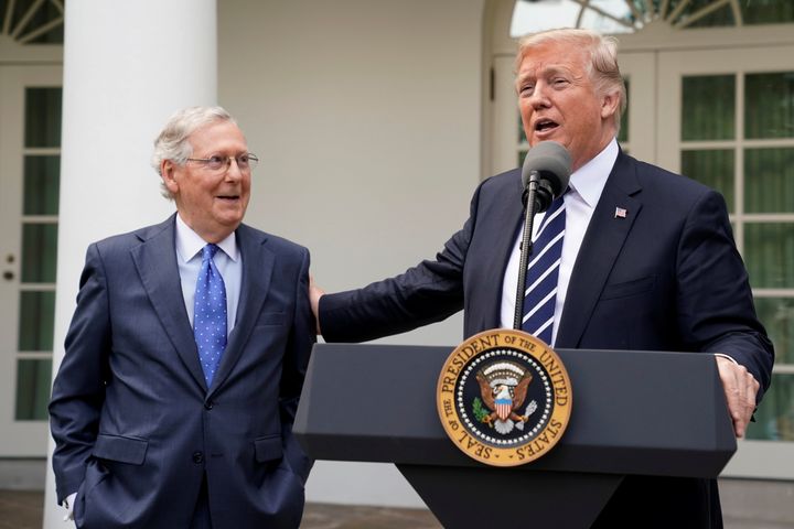 President Donald Trump and his right-hand man, Senate Majority Leader Mitch McConnell, who has helped to fill up the federal courts with Trump's conservative judges.