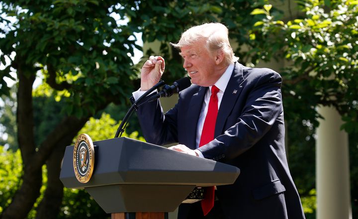 President Donald Trump refers to amounts of temperature change as he announces his decision that the United States will withdraw from the landmark Paris Agreement on June 1, 2017.
