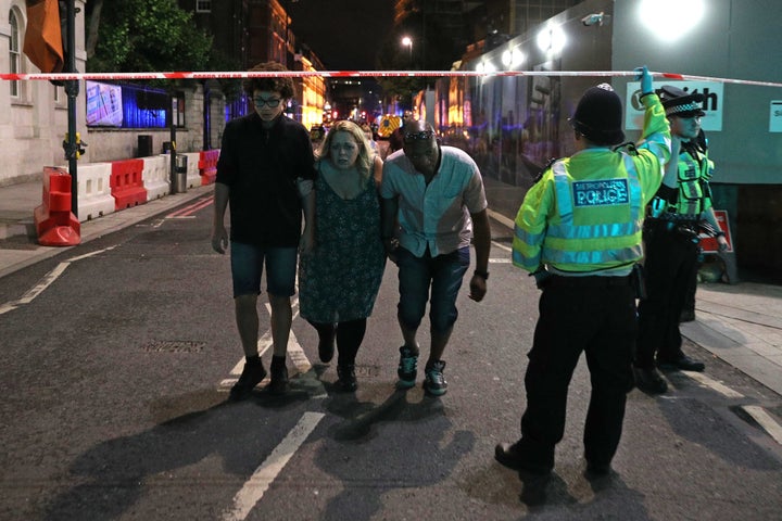 Police officers clearing the area near Borough Market on the night of the attacks 